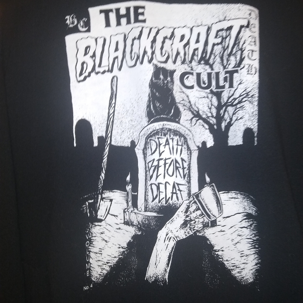 Blackcraft cult women's L shoulder cut sweater
